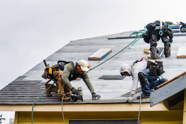 Professional Gutter Installation technician working in Quanah, TX